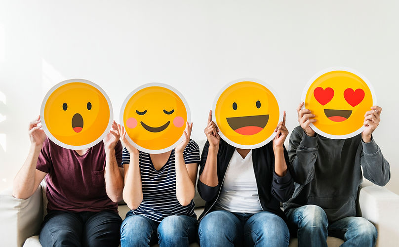 Diverse-people-holding-emoticon-1010507492_2203x1364.jpeg