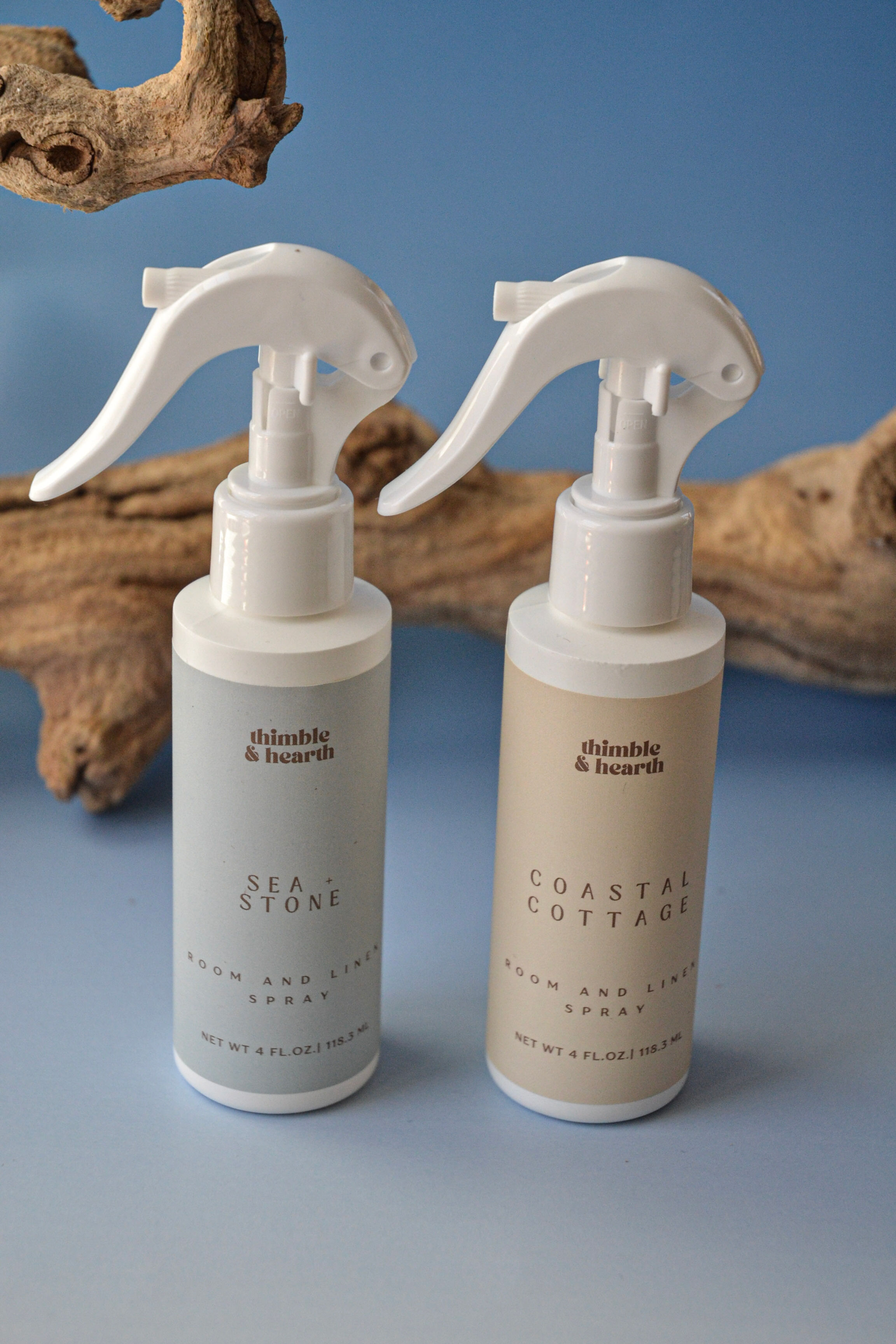 Thimble and Hearth Coastal Cottage linen spray in a white 4 oz bottle, a bergamot and peony coastal mist