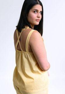 תמונה ממוזערת: Top MA-LII in light yellow made from 100% organic cotton