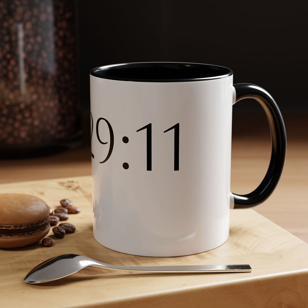 Thumbnail: White mug with black handle, '9:11' text, spoon, coffee beans
