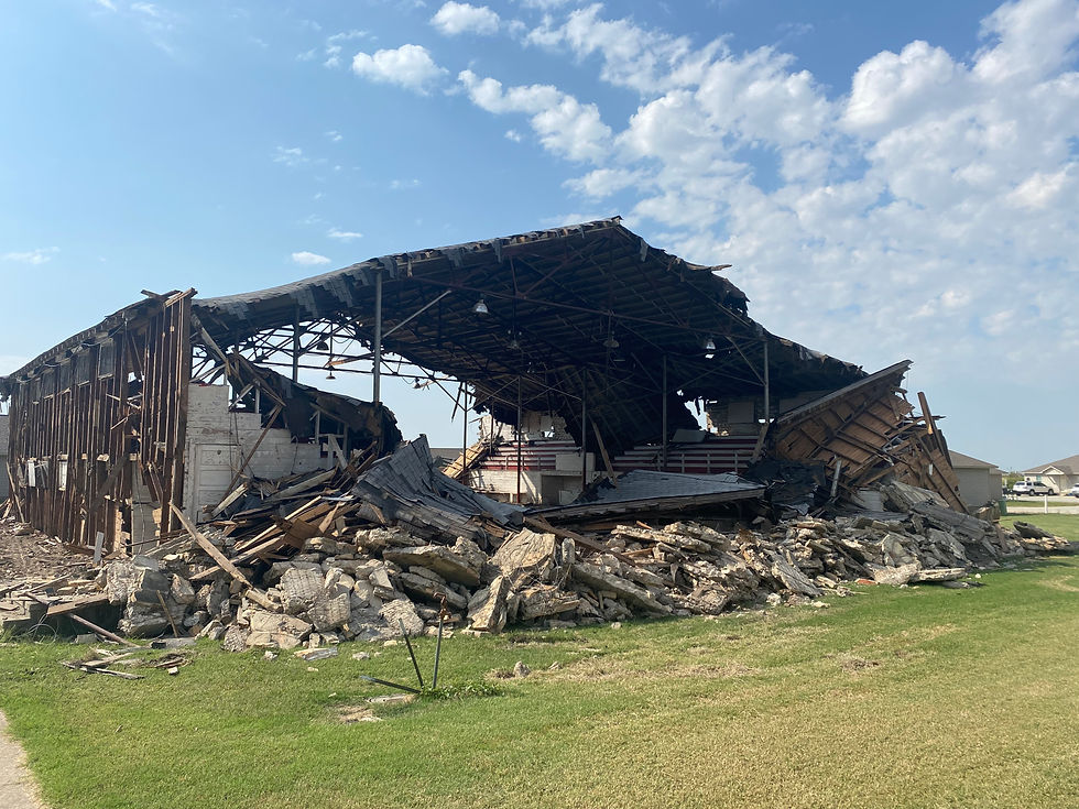 The crumbling remains of the gymnasium in Bono, Craighead County, Arkansas in 2025. The gym was built in the late 1940s and was used by the school until it consolidated in 1966. The above picture shows the historic building in mid demolition. Only the old school building presently stands.