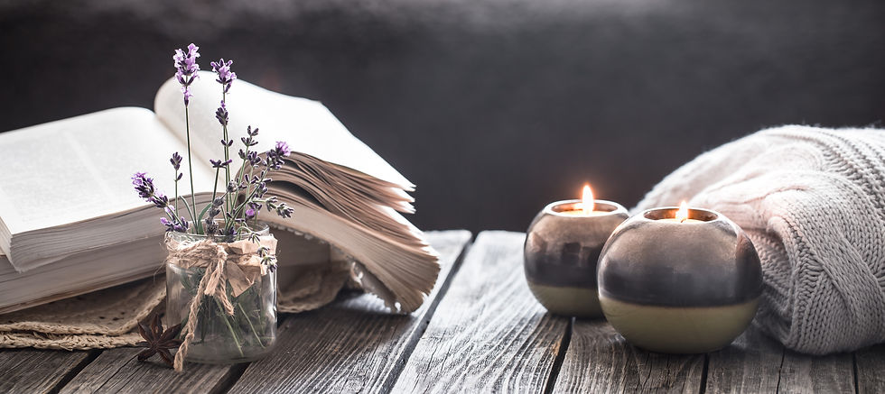 still-life-book-candle-wooden-wall.jpg