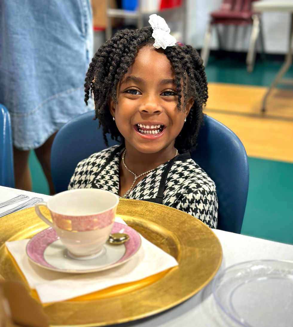 Student enjoying the tea party