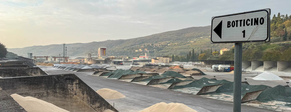 Large Piles of Aggregate well separated into different piles: "Piles of sorted aggregate for Terrazzo"