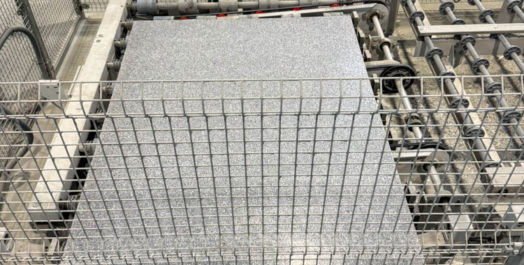 Large Slabs of Terrazzo being cut to size: "Precision cutting of Terrazzo slabs"