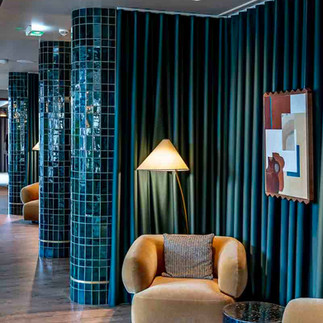 Tilers in London completing elegant bathroom tiles at Mason & Fifth Hotel