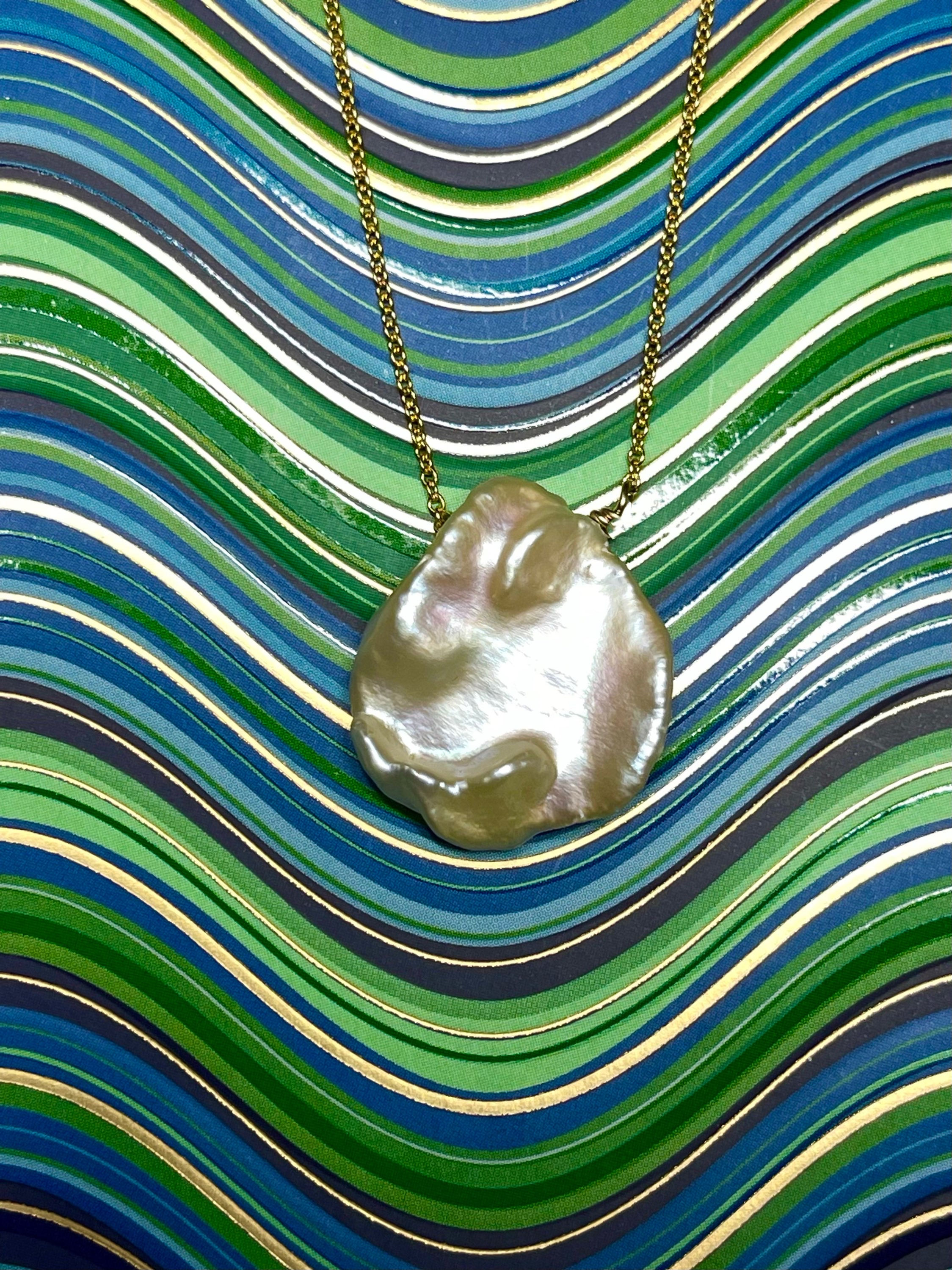 Keshi pearl on gold chain