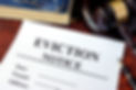 Eviction notice and gavel on a table..jpg