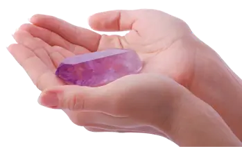 Healing crystal in hand