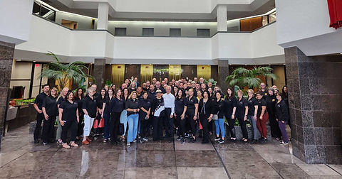 Imperial Service Systems team in the lobby of the corporate headquarters