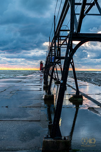 Picture of lighthouse in South Haven, MI. Gorgeous sunset in the background.