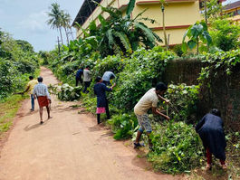 Voluntary Service of Cleaning up the road side surroundings by Chowkar Ward