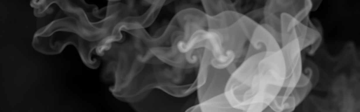 black background with a white and gray loose smokey effect across the screen.jpg