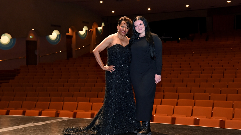 Colleen Jennings-Roggensack (left) wearing the gown designed by Abigail Davis.