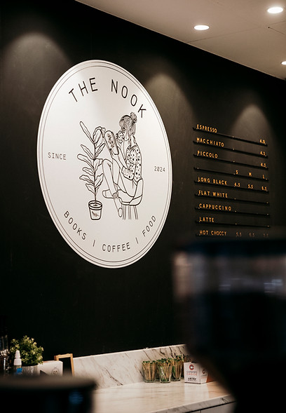 Logo of a cafe called The Nook that sells coffee, food, and books