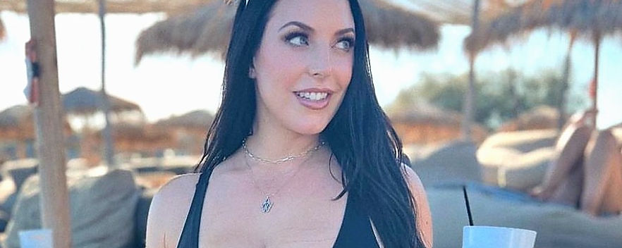 Angela enjoys her vacation with sleek black hair styled by Vered Salon.