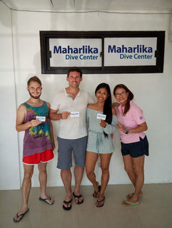 Instructor with newly certified diver at Maharlika Dive Center Batangas