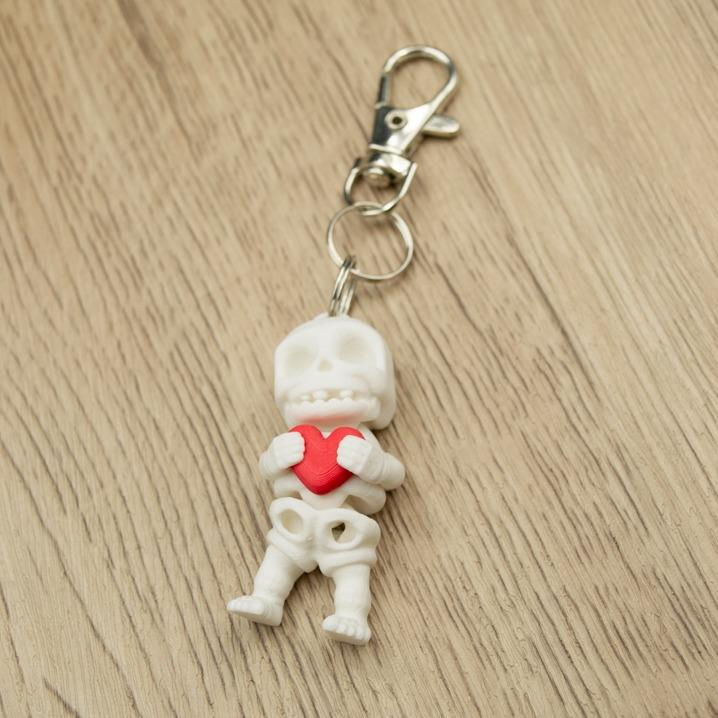 Thumbnail: Skeleton Keyring and Fidget Toy | High Quality 3D Printed Drop-Dead Gorgeous