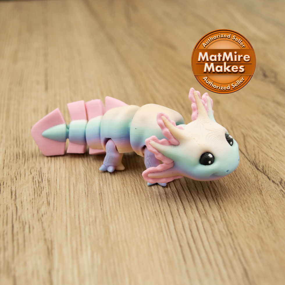 3D printed pastel axolotl fidget model with articulated joints and soft gradient colours