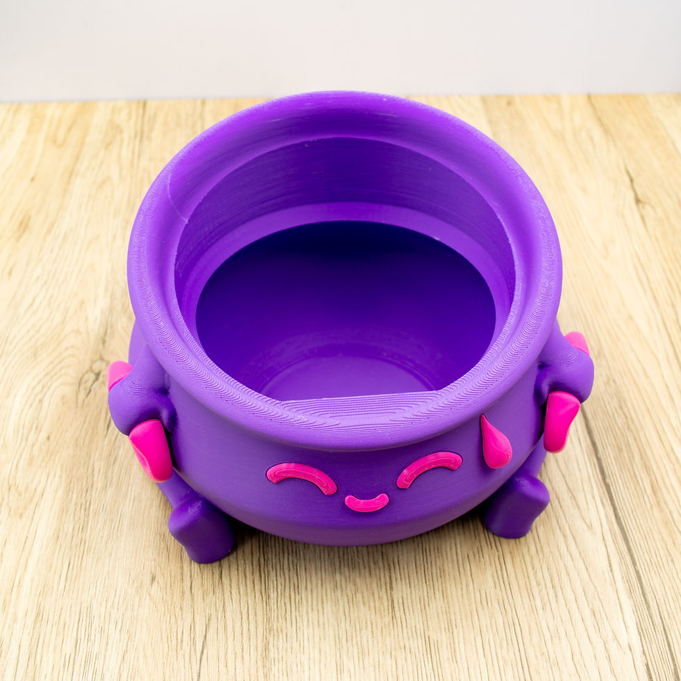 Thumbnail: Top view of funny cauldron storage pot in purple with pink facial details