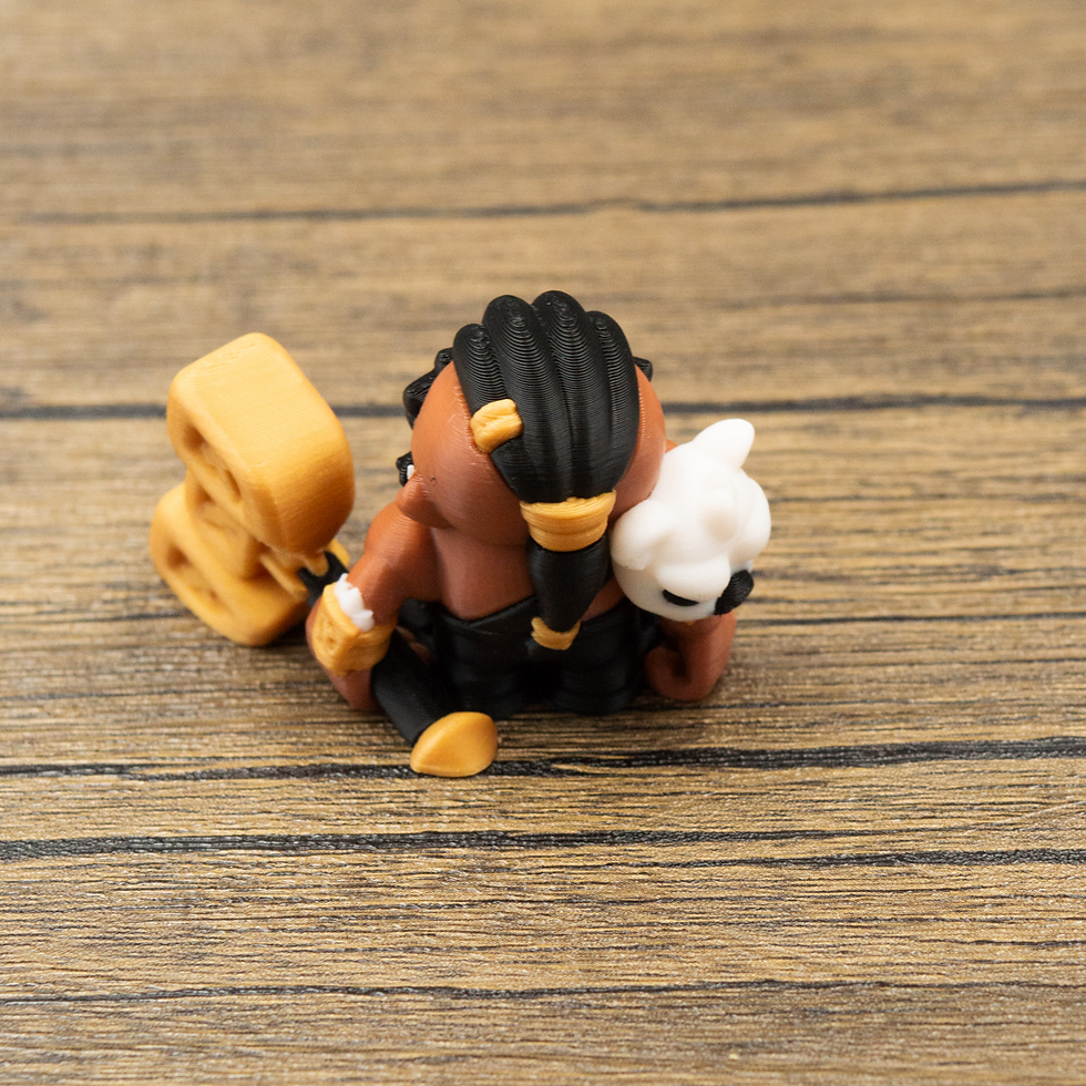 Thumbnail: Rear shot of dwarf with braided hair and skull.