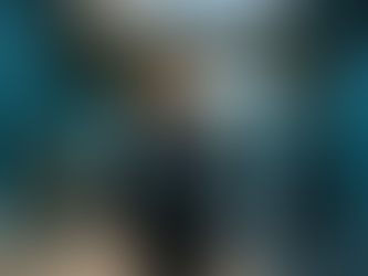 Geoffrey Hinton walking through a bright, futuristic research campus filled with neural net visuals and interactive AI systems, symbolising the intersection of knowledge, risk, and emerging intelligence.