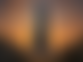 A bright, photorealistic image of a crystal-like AI monolith rising from a forest at dawn, surrounded by scientists and philosophers who stand in awe, reflecting the contrast between nature and machine intelligence.