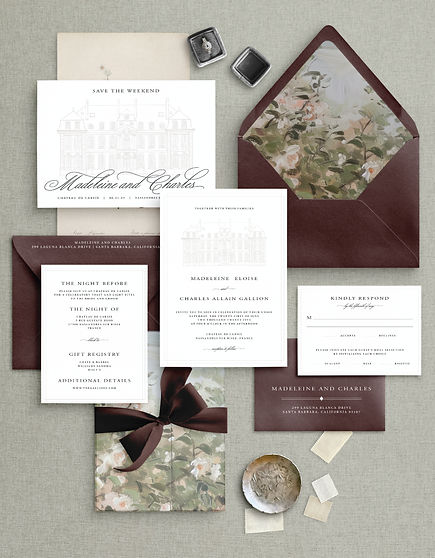 The "Architect" wedding invitation suite, showcasing a classic burgundy and cream color story. Features detailed venue line a