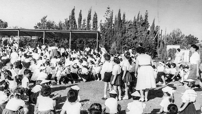 Schoolchildren celebrating Shavuot at Nir School yard Kiryat Ono 1960