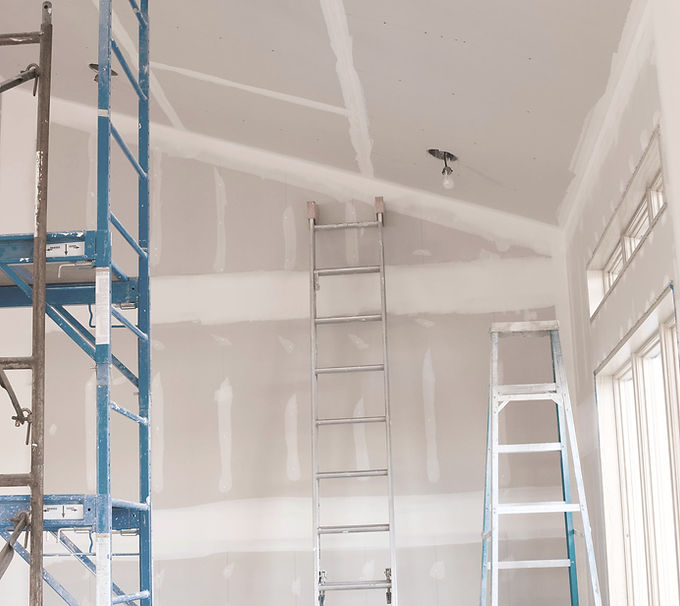 drywall and scaffolding with ladder