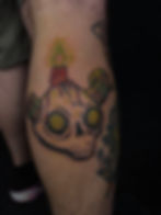 The Lich, from adventure time, Skull tattoo with lit candle on calf