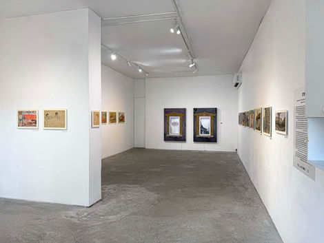 Gallery view colorful drawings hanging on the walls