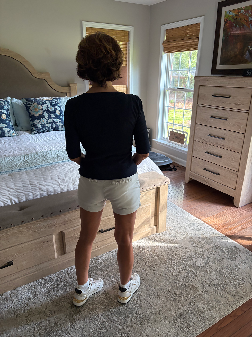 petite woman modeling elbow length shirt back view