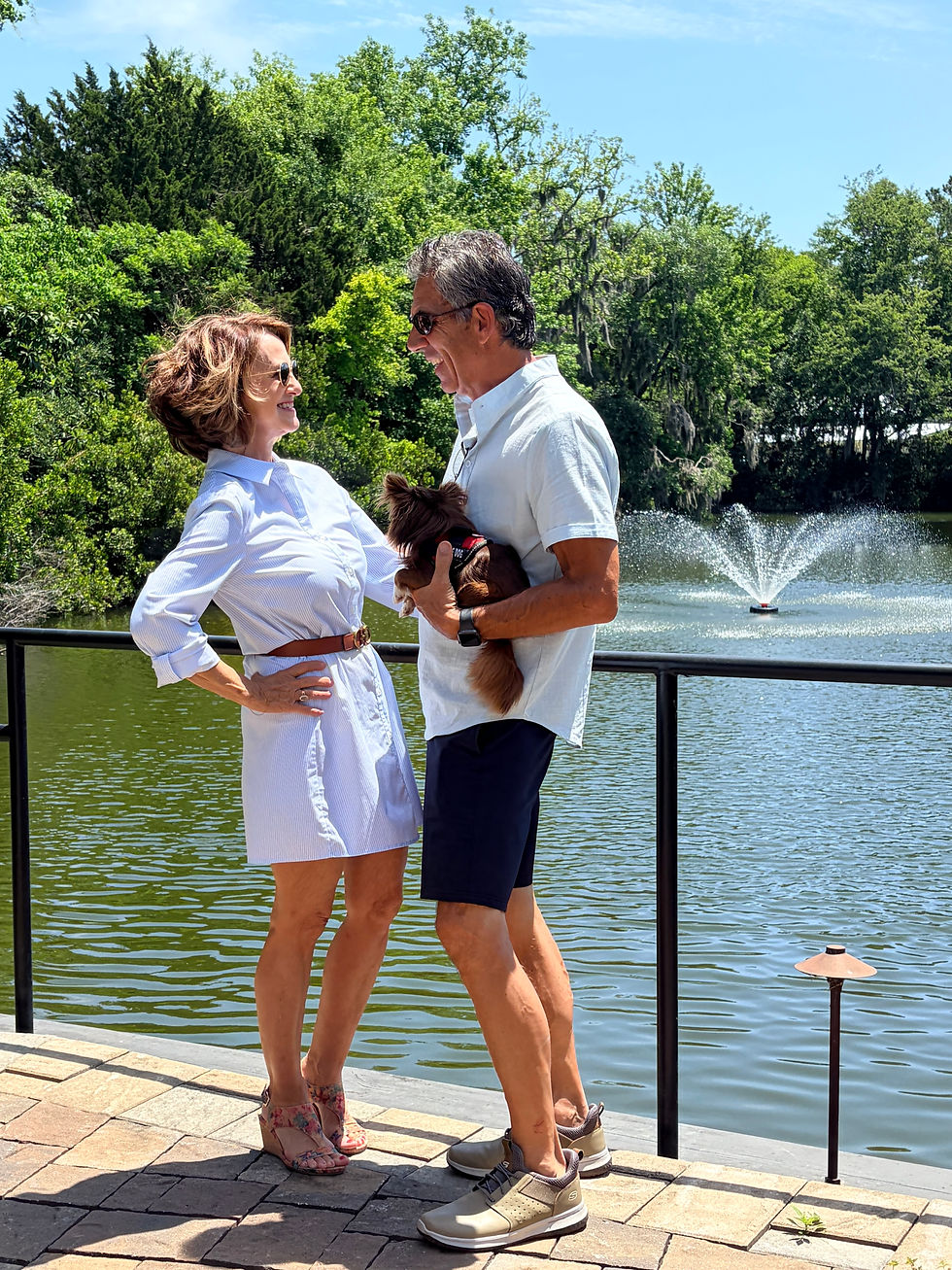 petite woman over 60 modeling a mini shirt dress with her husband