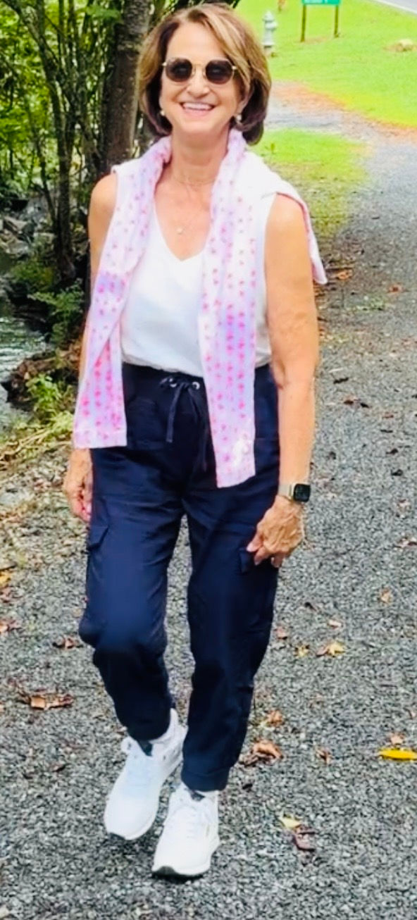 Petite woman over 60 modeling cargo pants outfit