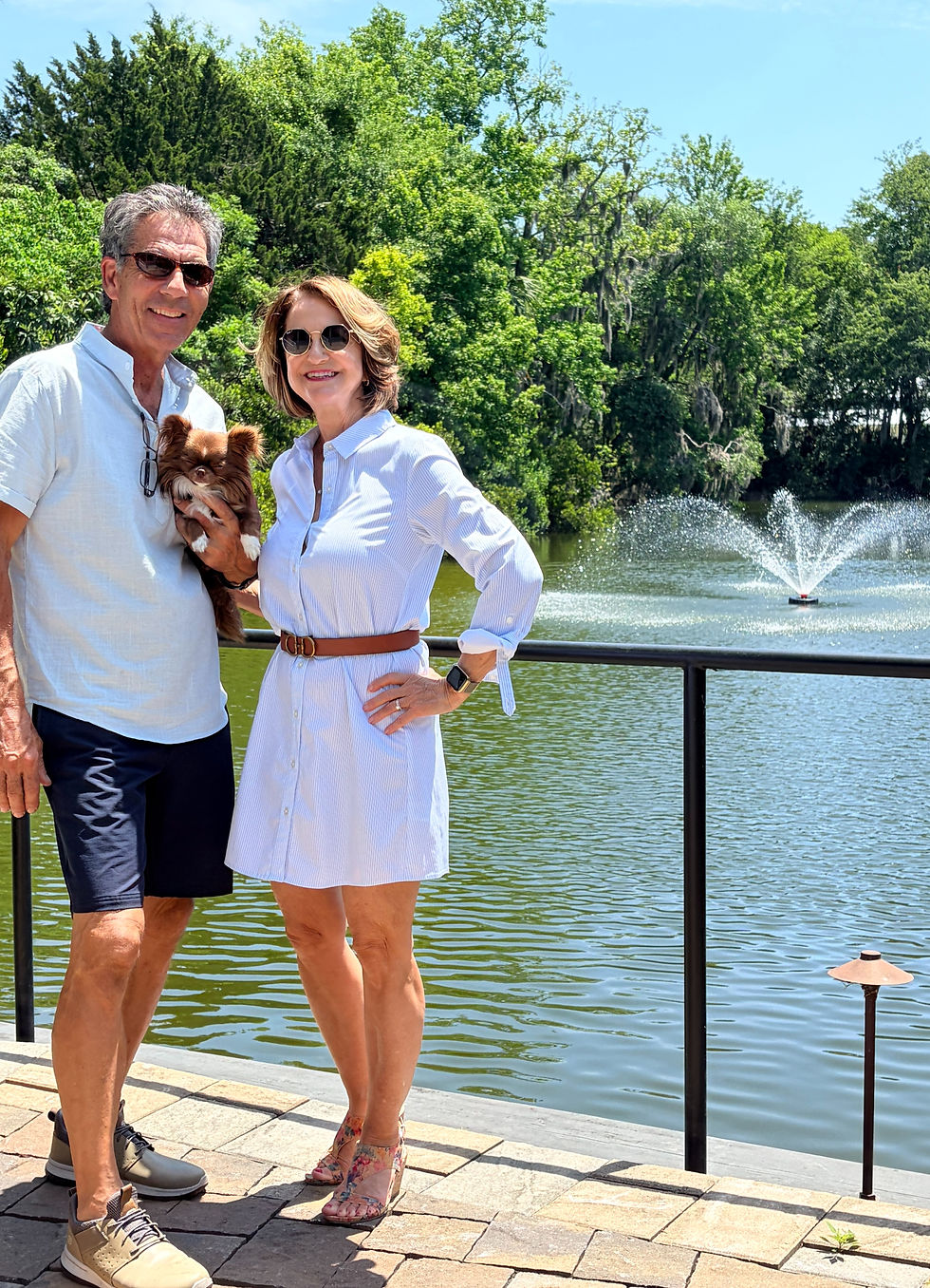 petite woman over 60 modeling a mini shirt dress with her husband