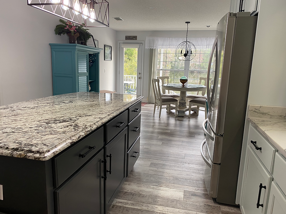 newly remodeled kitchen and dining area with view of lake out the back window