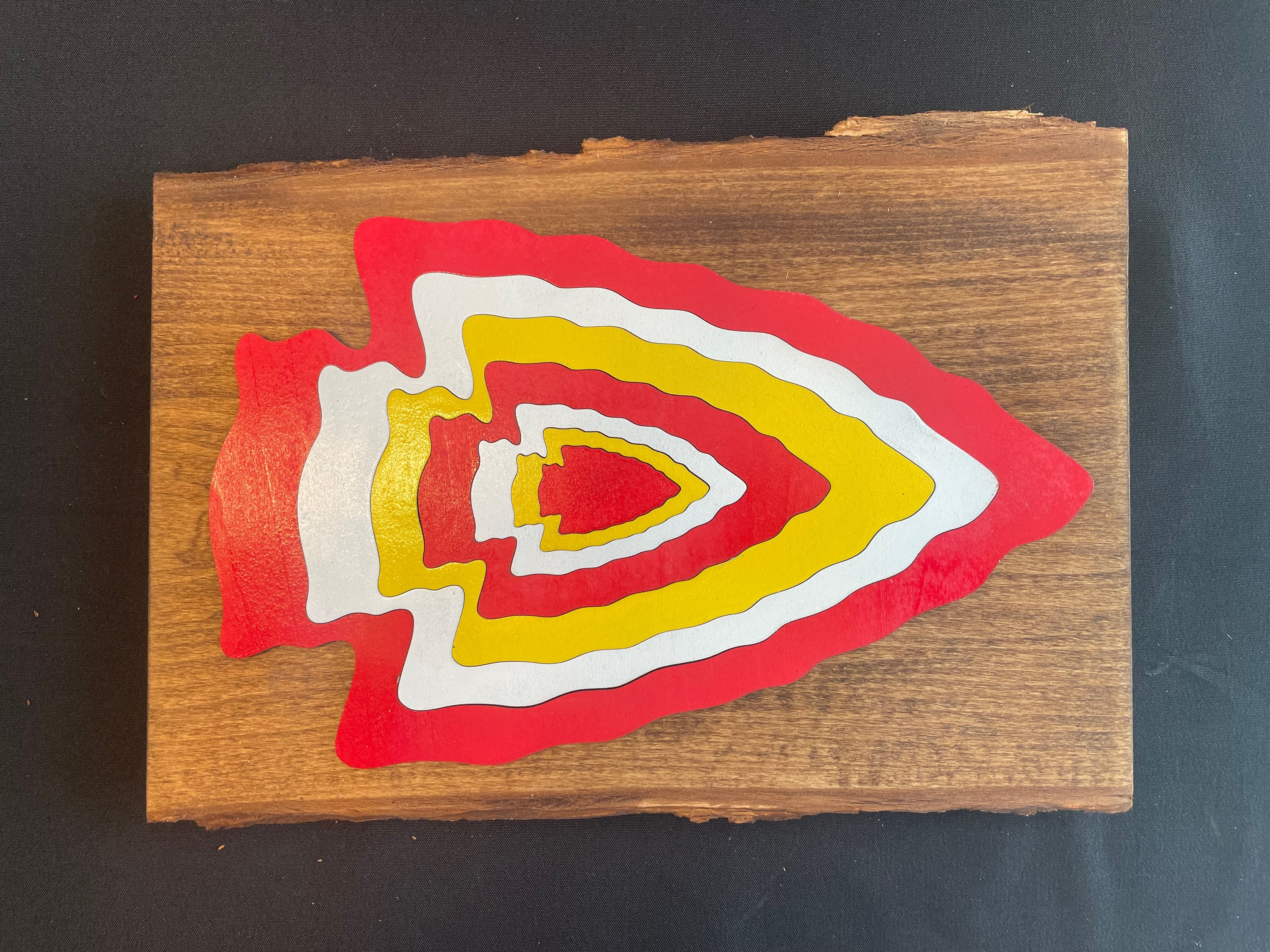 Red, White and Yellow Arrow Head