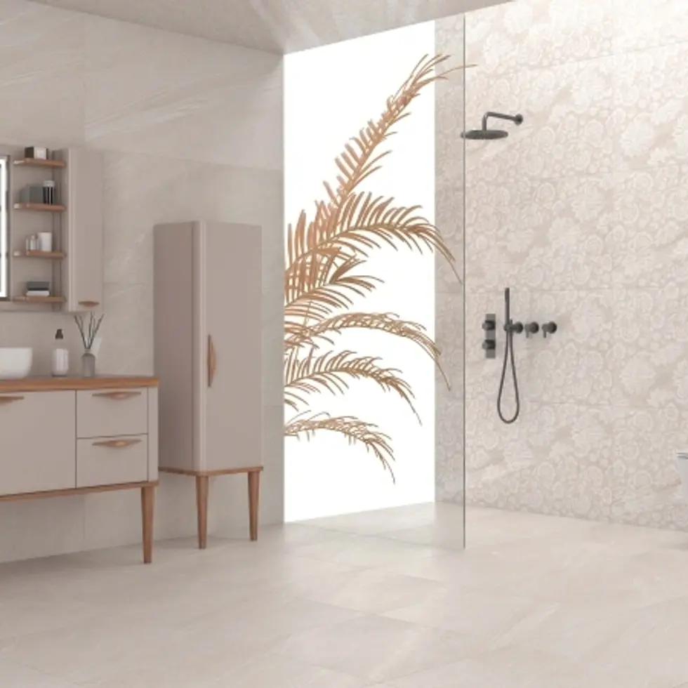 Salle de bain moderne carrelée avec douche et meuble.