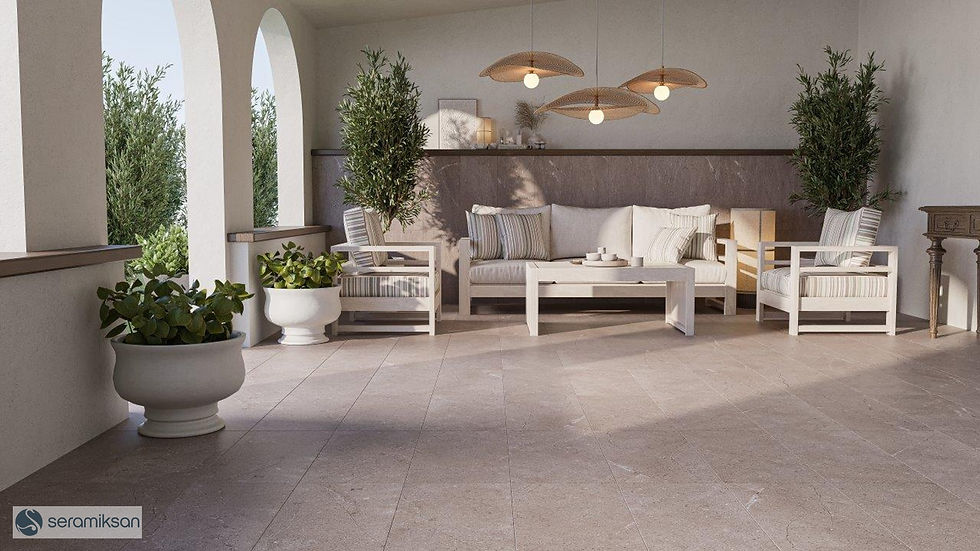 Terrasse aménagée avec canapé blanc, table et plantes