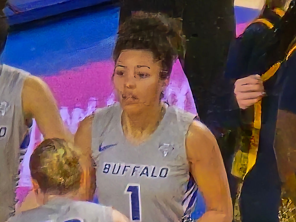 Buffalo Bulls guard Gabby McDuffie huddling up with teammates in Saturday's contest against the Toledo Rockets 