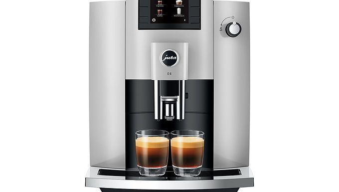 Front view of Jura E6 automatic espresso machine with color display screen