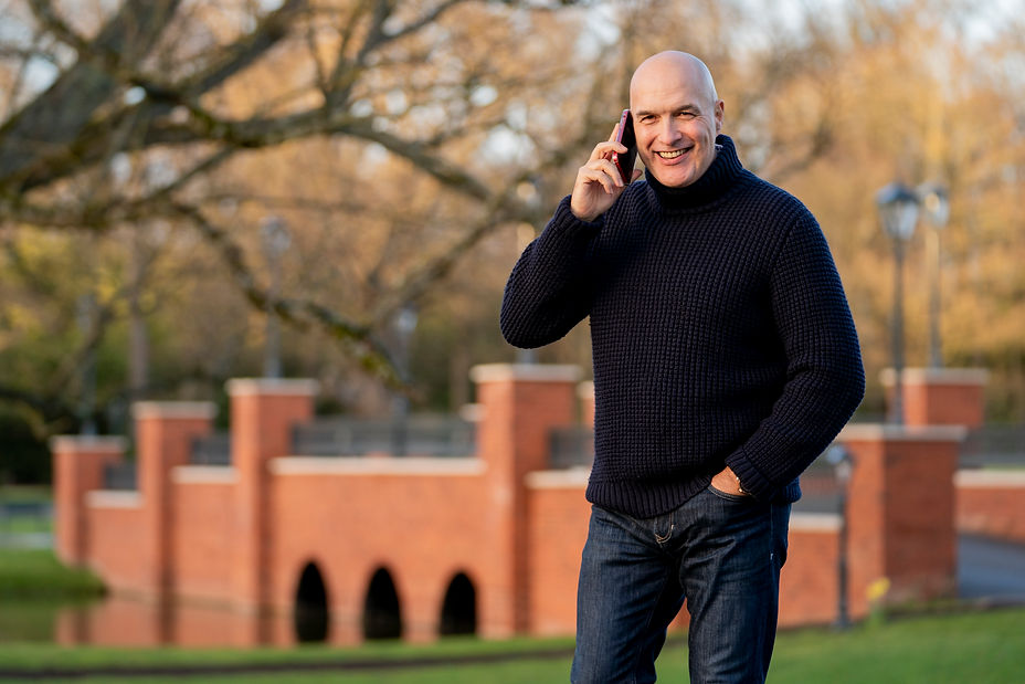 Coach Talking with clent on phone