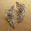 Thumbnail: Smart Indo Western Danglers in white and red AD stones