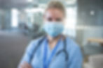 portrait-confident-caucasian-female-medical-professional-wearing-face-mask-scrubs-social-d
