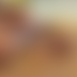 Slicing the cooked and rested skirt steak into long, thin strips on a wooden cutting board