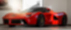 red ferrari 458 italia parked in front of white wall_edited.jpg