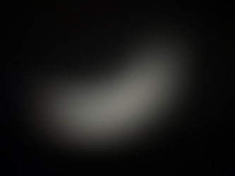 Dangling from the horned moon, but dancing