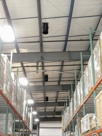 Destratification fan in warehouse.