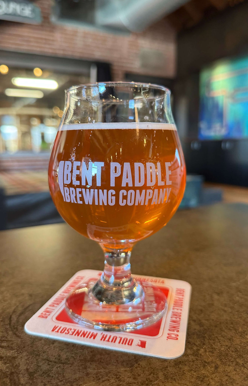 Photo of a glass of Very Berry sour beer